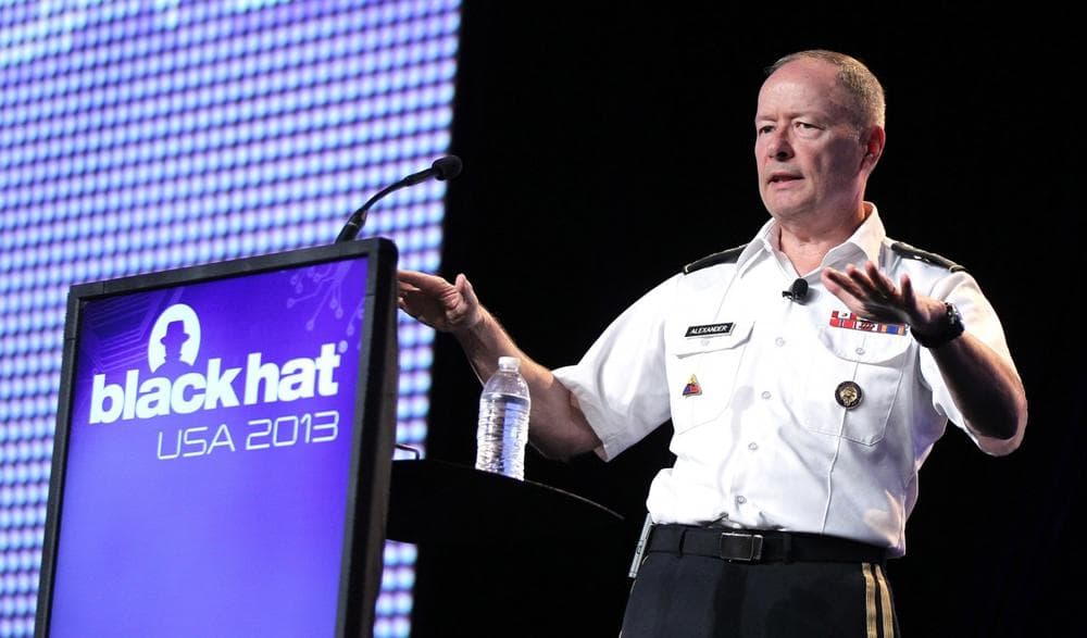 Army General Keith Alexander, head of the National Security Agency delivers a keynote address at the Black Hat hacker conference on Wednesday, July 31, 2013, in Las Vegas. (Isaac Brekken/AP)