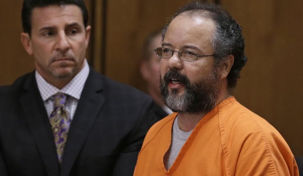 Ariel Castro, right, speaks during the sentencing phase as defense attorney Craig Weintraub watches Thursday, Aug. 1, 2013, in Cleveland. Castro was sentenced to life in prison plus 1,000 years. (Tony Dejak/AP)
