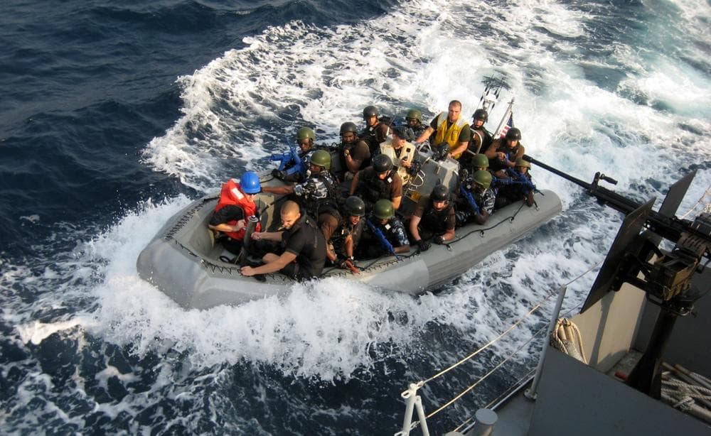 A crew of U.S. sailors and Nigerian special forces fighters engages in training exercise off the Nigerian coast in 2010. The U.S. Navy offered training to the Nigerian navy as worries mount of increasingly violent pirate attacks along the West African coast. (Jon Gambrell/AP)