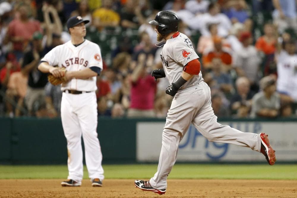 Boston Red Sox's Jonny Gomes, right, rounds the bases in front of Houston Astros' Matt Dominguez on a three-run homer in the sixth inning. (AP/Pat Sullivan)