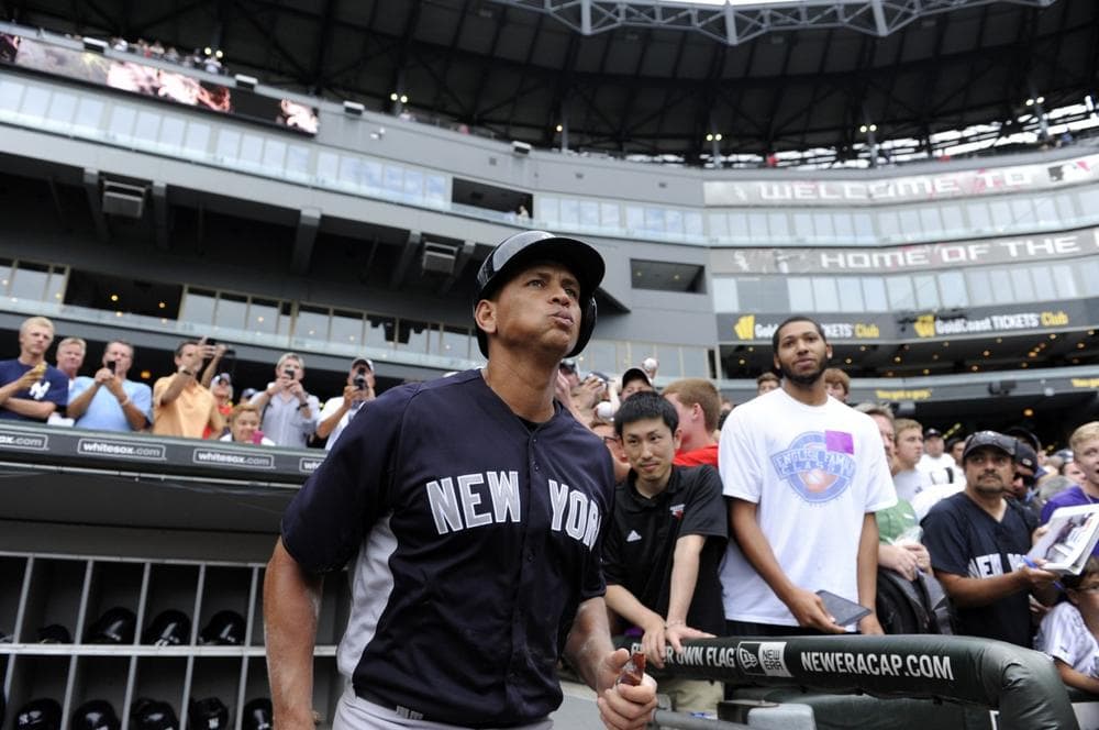 Alex Rodriguez is taking the field for the New York Yankees while the MLB Players Association appeals his 211-game suspension. (David Banks/AP)