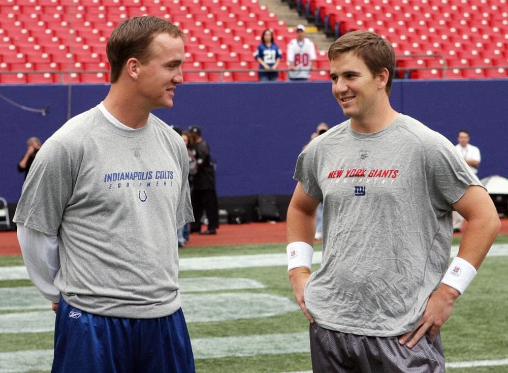 After hearing the duo's rhymes, Only A Game analyst Charlie Pierce thinks Peyton and Eli Manning should stick to their day jobs. (Jerry Pinkus/AP)