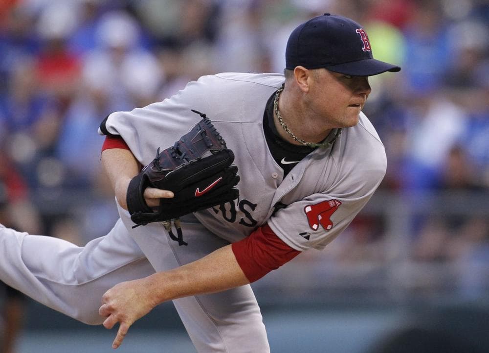 Boston Red Sox pitcher Jon Lester throws against a batter in the first inning of a baseball game against the Kansas City Royals. (AP/Colin E. Braley)
