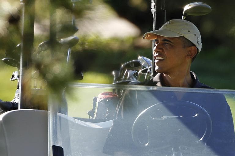 President Barack Obama plays golf at Farm Neck Golf Club in Martha's Vineyard while on vacation in 2011. (Steven Senne/AP)