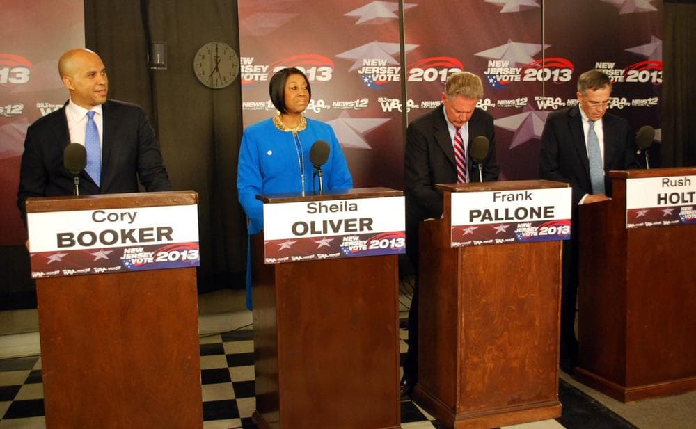 In this photo provided by WBGO, Democratic U.S. Senate candidates, from left, Newark Mayor Cory Booker, State Assembly Speaker Sheila Oliver, U.S. Frank Pallone and U.S. Rep. Rush Holt prepare for a debate Thursday, Aug. 8, 2013, at the WBGO Performance Studio in Newak, N.J. (WBGO via AP)