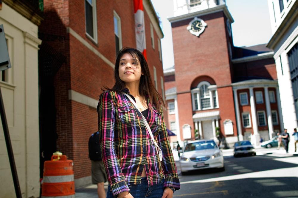 Katherine Asuncion, 20, who came to the U.S. from the Dominican Republic at age 10, was granted deferred action status last December. It has changed her life in substantial ways, she says, but there are caveats. (Jesse Costa/WBUR)