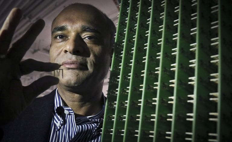 Chet Kanojia, founder and CEO of Aereo, holds one of the company's antennas. When you subscribe to the service, you’re basically renting one of these antennas, using the Internet as the cord, and using a cloud server like an online DVR. (Bebeto Matthews/AP)