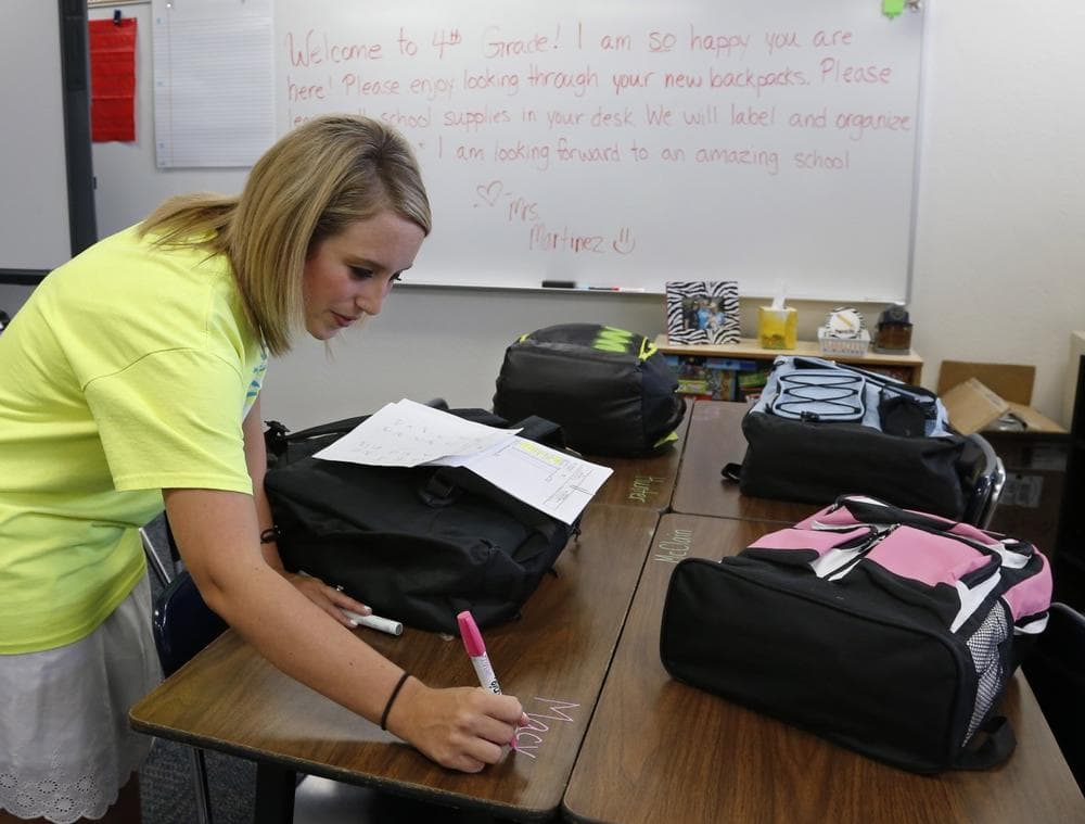 Kimberly Martinez, a fourth-grade teacher for Plaza Towers Elementary school at their temporary location in Central Junior High school. Classes begin Friday for the students who lost their school in the May 20th tornado. (Sue Ogrocki/AP)