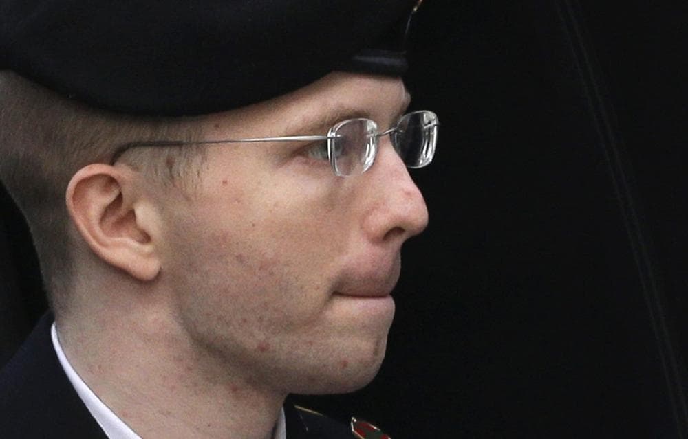 Army Pfc. Bradley Manning is escorted into a courthouse in Fort Meade, Md., Wednesday, Aug. 21, 2013, before a sentencing hearing in his court martial. (Patrick Semansky/AP)