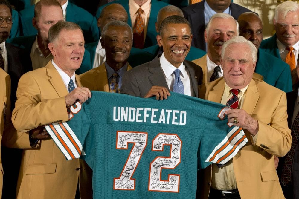 Quarterback Bob Griese (left), coach Don Shula and members of the 1972 Miami Dolphins were honored at the White House on Tuesday. (Jacquelyn Martin/AP) 