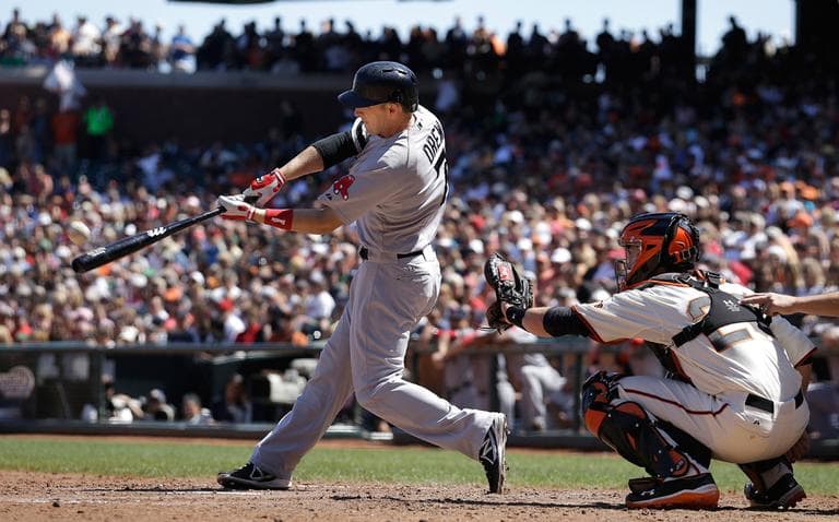 Boston's Stephen Drew hits a three-run home run off San Francisco pitcher Michael Kickham during the seventh inning Wednesday. (Jeff Chiu/AP)