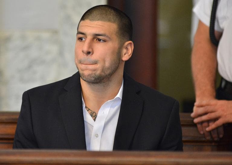 Former New England Patriot Aaron Hernandez, who was indicted on murder charges, listens to proceedings in an Attleboro court Thursday. (Josh Reynold/AP)