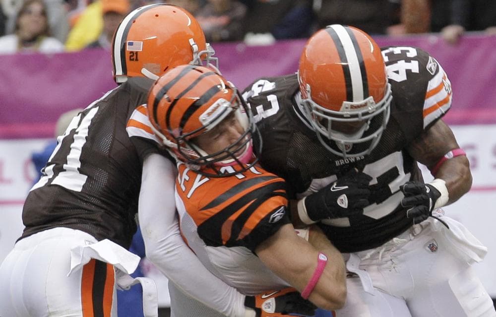 This hit, Oct. 3, 2010, left the Cincinnati Bengals&#039; Jordan Shipley (center) with a concussion, and the Cleveland Browns&#039; T.J. Ward (right) with a fine. (Amy Sancetta/AP)