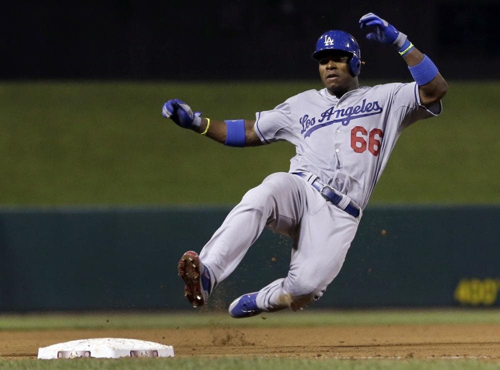 After a blistering start to his MLB career, Yasiel Puig has struggled in recent contests. (Jeff Roberson/AP) 