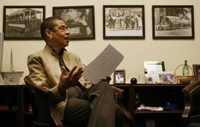 Delegate Eleanor Holmes Norton sits in front of historical photographs of Washington in her office in the House Rayburn building in Washington, Monday, April 9, 2007. (Jacquelyn Martin/AP)
