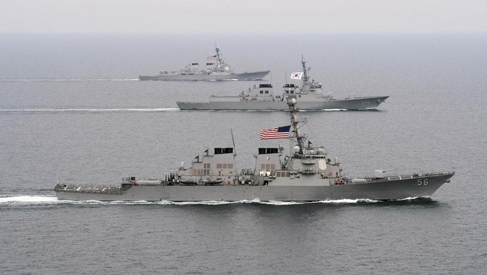 U.S. Navy destroyers are pictured during exercises in March 2013. (Specialist 3rd Class Declan Barnes/U.S. Navy via AP)