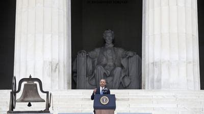 President Barack Obama speaks at the 50th Anniversary of the March on Washington where Martin Luther King Jr., spoke, Wednesday, Aug. 28, 2013, at the Lincoln Memorial in Washington. The bell at left rang at the 16th St Baptist Church in Birmingham, Ala. which was bombed 18 days after the March On Washington killing four young girls. (Charles Dharapak/AP)