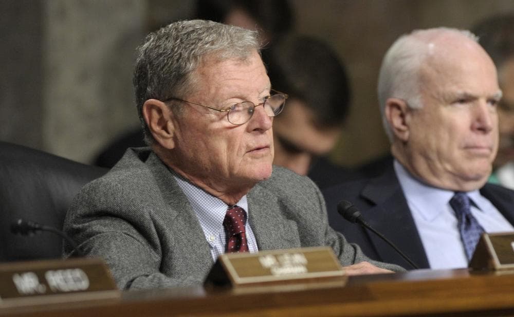 Senate Armed Services Committee member Sen. James Inhofe, R-Okla., left, is pictured in January 2013. At right is Sen. John McCain, R-Ariz., the ranking Republican on the committee. (Susan Walsh/AP)