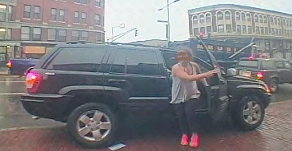 In this surveillance photograph made available by the Boston Police Department, Amy Lord, a 24-year-old woman from the South Boston neighborhood, steps out of a Jeep on Tuesday morning July 23, 2013, in Boston. Lord was found stabbed to death in a Boston park after she was abducted and taken to several banks to withdraw money before she was killed, Boston police said Wednesday. (AP Photo/Boston Police Department)