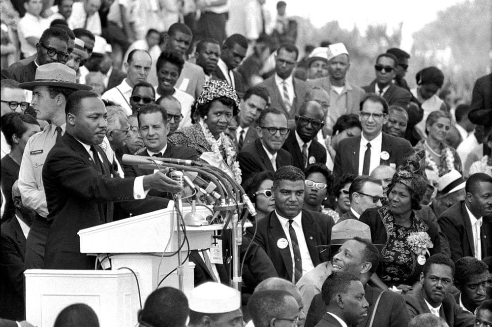 In this Aug. 28, 1963 file photo, the Rev. Dr. Martin Luther King Jr., head of the Southern Christian Leadership Conference, speaks to thousands during his &quot;I Have a Dream&quot; speech in front of the Lincoln Memorial for the March on Washington for Jobs and Freedom, in Washington. Actor-singer Sammy Davis Jr., is at bottom right. (AP)