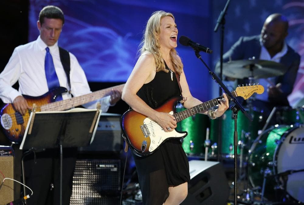 Susan Tedeschi performs during rehearsal for the Boston Pops Fourth of July concert at the Hatch Shell in Boston, Wednesday, July 3, 2013. (AP Photo/Michael Dwyer)