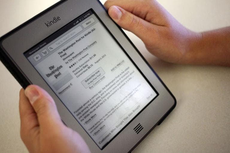 In this Monday, Aug. 5, 2013, photo, The Washington Post for Kindle application is displayed for purchase on an Amazon Kindle in New York. (AP)