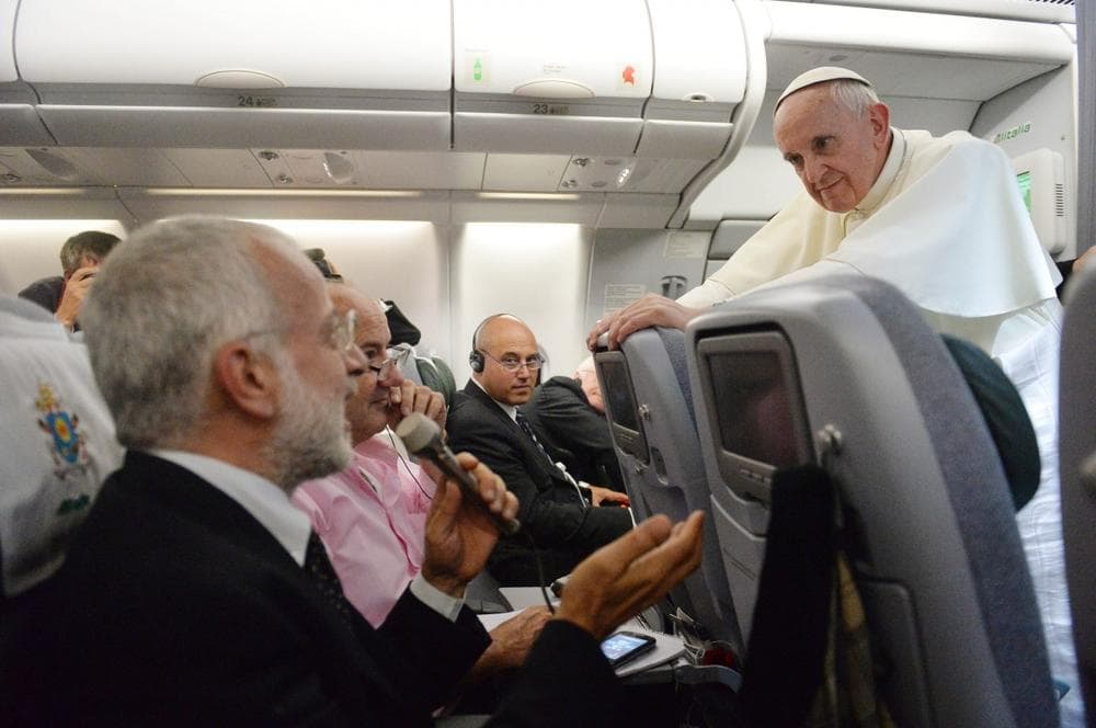 Pope Francis said he would not judge priests for their sexual orientation in a remarkably open and wide-ranging news conference Monday as he returned from his first foreign trip. (AP/Luca Zennaro)