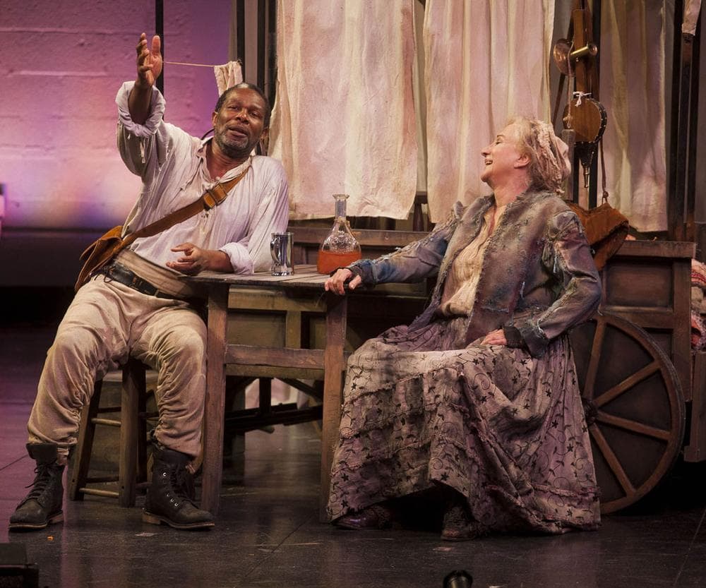 John Douglas Thompson as the cook and Olympia Dukakis as Mother Courage catch up during a brief outbreak of peace. (Courtesy photo)