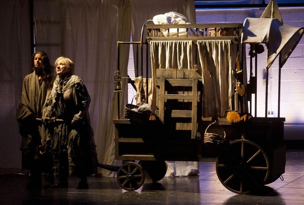 Brooke Parks as Mother Courage’s daughter Kattrin and Olympia Dukakis as Mother Courage pull the canteen wagon. (Courtesy photo)