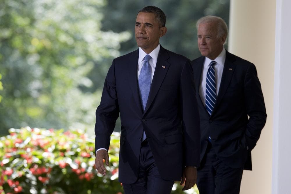 Vice President Joe Biden, right, and President Barack Obama arrive to make a statement about the ongoing situation in Syria in the Rose Garden of the White House on Saturday, Aug. 31, 2013 in Washington. (Evan Vucci/AP)
