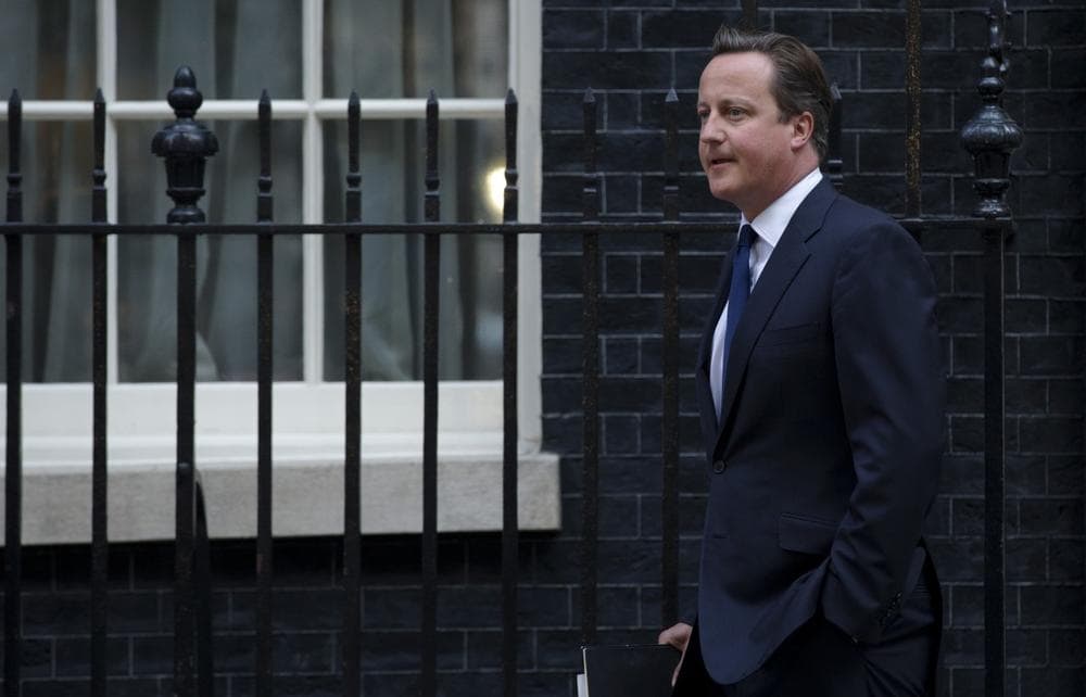 Britain's Prime Minister David Cameron leaves 10 Downing Street in London, to be driven to the Houses of Parliament for a debate and vote on Syria, Thursday, Aug. 29, 2013. (Matt Dunham/AP)