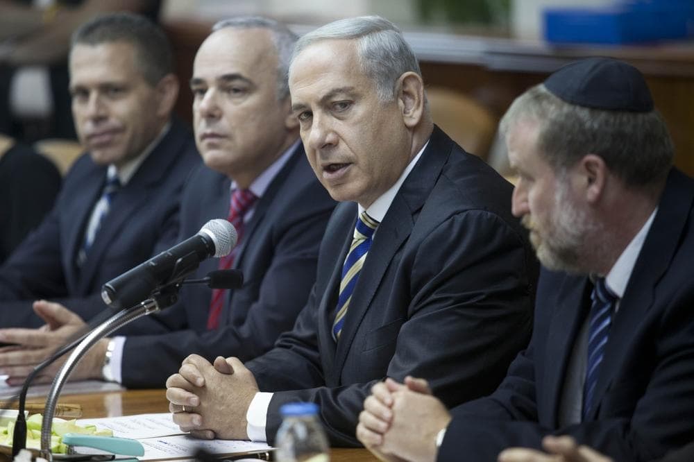 Israeli Prime Minister Benjamin Netanyahu, second right, chairs the weekly cabinet meeting in Jerusalem, Israel, Sunday, September 1, 2013. (Abir Sultan/AP)