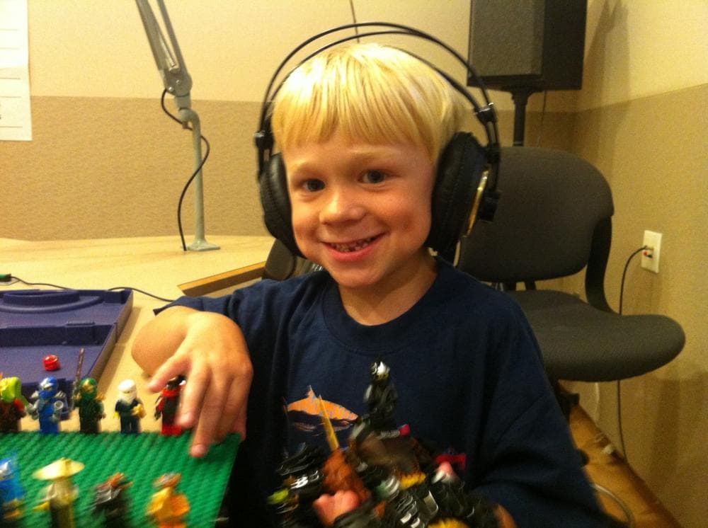 Sam Sullivan, 5, is pictured in the Here &amp; Now studios. (Katherine Gorman/Here &amp; Now)