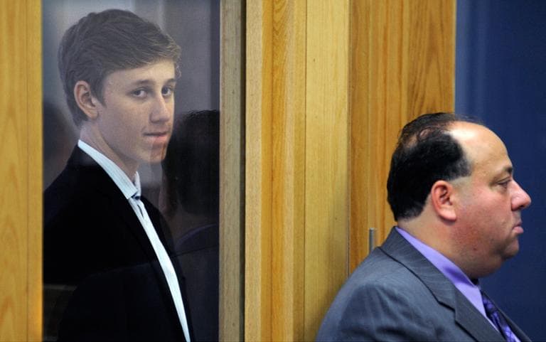 Galileo Mondol, 17, left, stands with his attorney, William A. Korman, during his arraignment at Central Berkshire District Court Tuesday in Pittsfield. (Christine Peterson/The Boston Globe/AP, Pool)