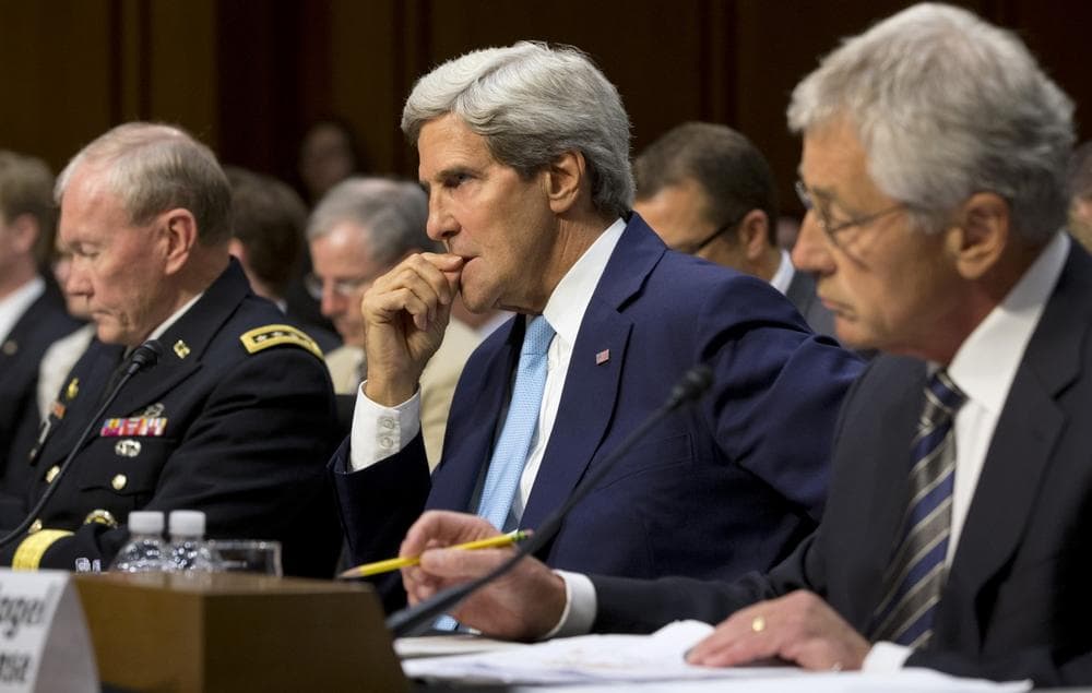 From left, Joint Chiefs Chairman Gen. Martin E. Dempsey, Secretary of State John Kerry, and Defense Secretary Chuck Hagel, listen on Capitol Hill in Washington, Tuesday, Sept. 3, 2013, during a Senate Foreign Relations Committee hearing on Syria. (Jacquelyn Martin/AP)