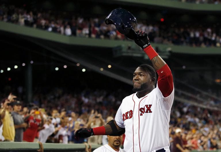 David Ortiz tips his helmet to the fans after hitting his second home run of the night, his 2,001st career hit.  (AP)
