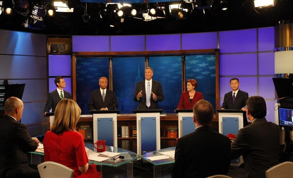 Democratic party New York mayoral candidates, on stage from left, Anthony Weiner, Bill Thompson, Bill de Blasio, Christine Quinn and John Liu stand together during a televised debate in New York, Tuesday, Sept. 3, 2013. (Andrew Hinderakerl/The Wall Street Journal via AP)