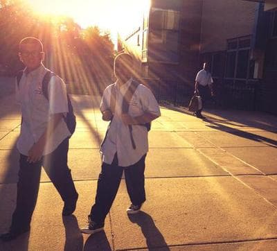 Students walk to Feltonville School of Arts and Science in Philadelphia, Sept. 9, 2013. (@hollyotterbein/Twitter)