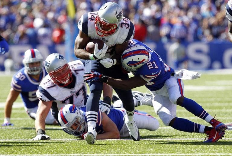Bills cornerback Leodis McKelvin tackles Patriots' Shane Vereen during the second half of Sunday's game. (Bill Wippert/AP)