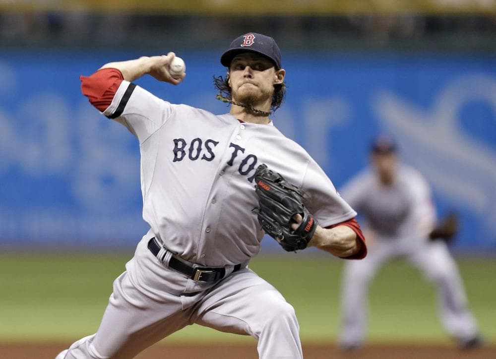 Boston Red Sox starting pitcher Clay Buchholz delivers to Tampa Bay Rays' Ben Zobrist during the first inning of a baseball game Tuesday, Sept. 10, 2013, in St. Petersburg, Fla. (AP Photo/Chris O'Meara)