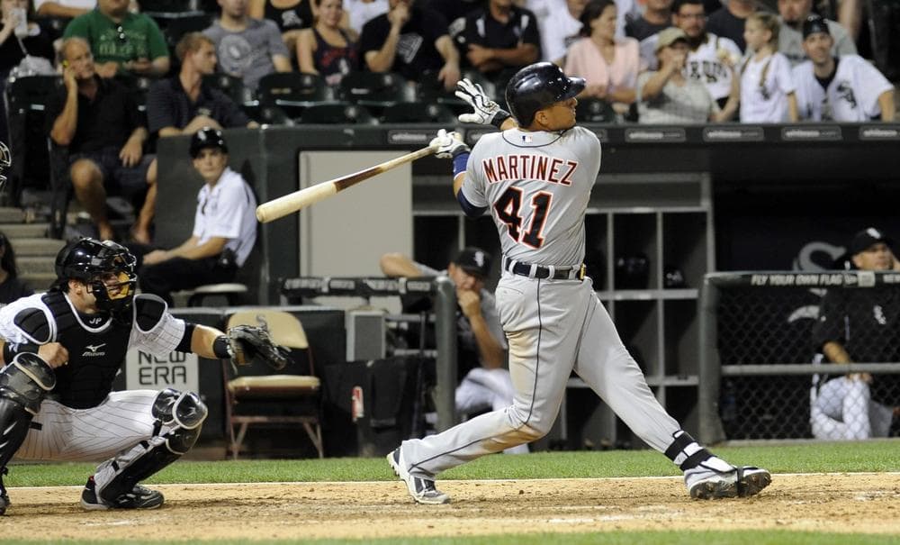 Detroit Tiger, Victor Martinez (41), hits a home run in a victory against the Chicago White Sox. (Matt Marton/AP)