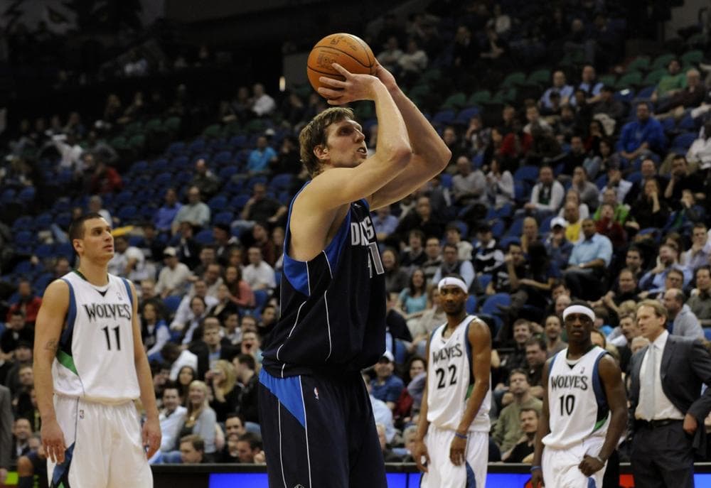 Dirk Nowitzki opposes Zach Lowe's proposal to shorten NBA games from 48 to 40 minutes. (Jim Mone/AP)