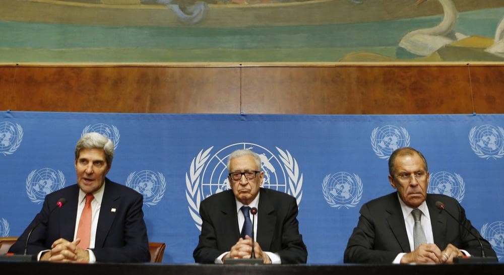 U.S. Secretary of State John Kerry, left, U.N. Special Representative Lakhdar Brahimi, center, and Russian Foreign Minister Sergei Lavrov deliver a statement to the media after a meeting discussing Syria at the United Nations offices in Geneva, Switzerland, Friday, Sept. 13, 2013. (Larry Downing/AP)