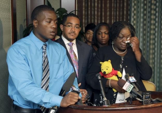 Willie Ferrell, left, talks about his relationship with his older brother, Jonathan Ferrell, at a media conference, as attorney Christopher Chestnut, center, his mother, Georgia Ferrell, right, listen on Monday, Sept. 16, 2013, in Charlotte, N.C. Police were called Sept. 14, after the former Florida A&amp;M University football player knocked on the door of a home near the car crash he was in. Ferrell was hit with a Taser as he approached officers and then shot, resulting in a voluntary manslaughter charge against one of the officers. (Bob Leverone/AP)