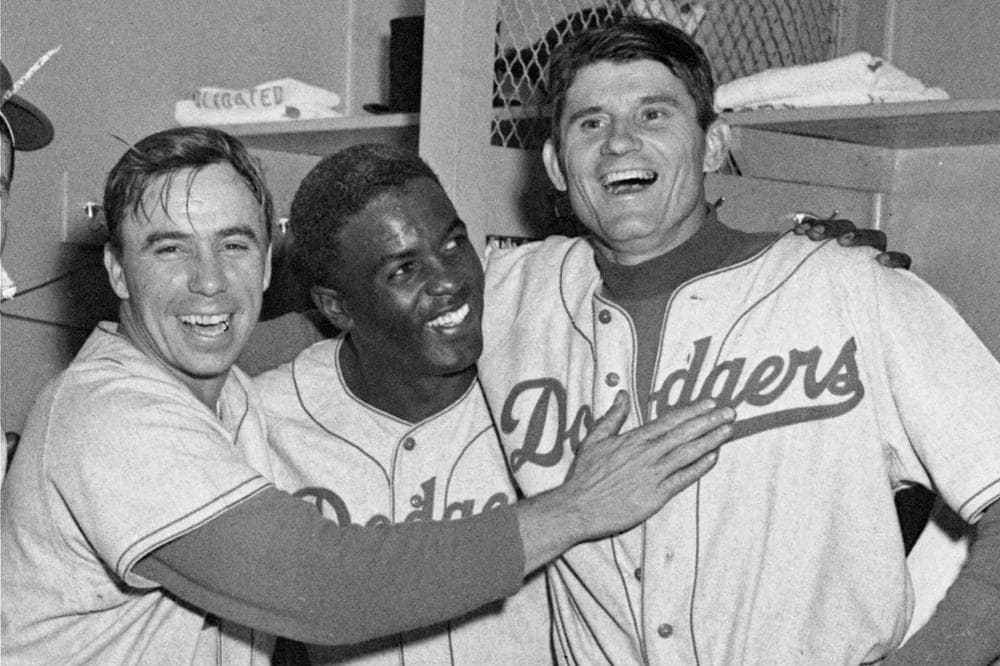 Brooklyn Dodgers players Pee Wee Reese, Jackie Robinson, and Preacher Roe (L-R) in 1952. (AP Photo)