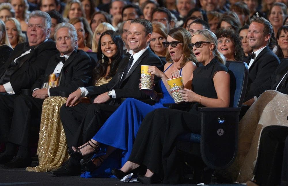 Michael Douglas, Luciana Barroso, Matt Damon, Tina Fey and Amy Poehler in the audience at the 65th Primetime Emmy Awards at Nokia Theatre on Sunday Sept. 22, 2013, in Los Angeles. (Frank Micelotta/Invision for Academy of Television Arts &amp; Sciences via AP)