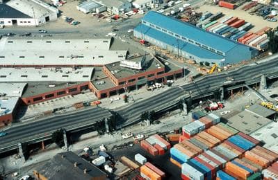 A collapsed section of the Cypress viaduct of Interstate 880 in Oakland, from the Loma Prieta California, Earthquake October 17, 1989. Click on image to enlarge. (H.G. Wilshire/USGS) 