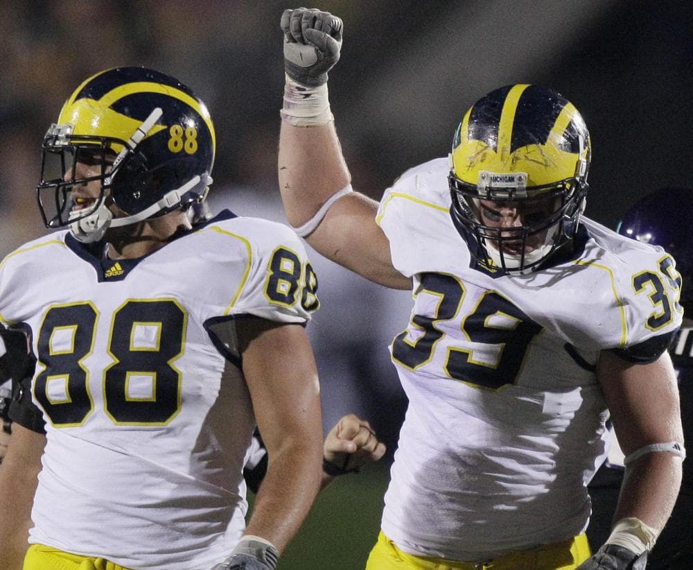 After four years playing defensive tackle at the University of Michigan, Will Heininger (right) is now raising awareness on mental health issues. (Nam Y. Huh/AP)
