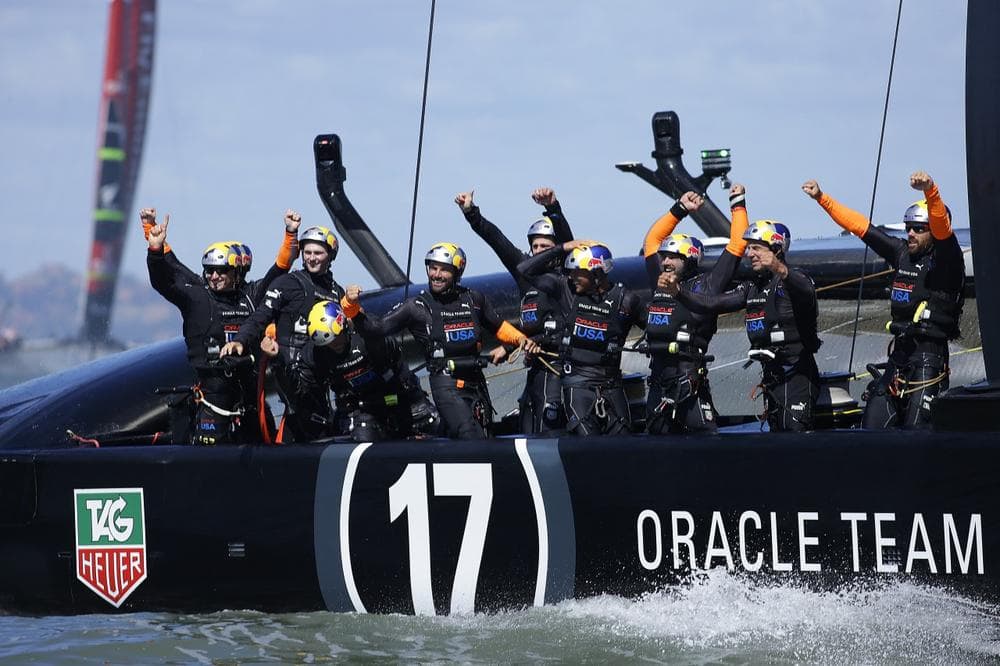 Oracle Team USA celebrates after winning the America's Cup in the 19th race against Emirates Team New Zealand. (Ben Margot/AP)
