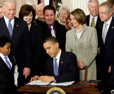 In this March 23, 2010, file photo, President Obama signs the Affordable Care Act. (J. Scott Applewhite/AP)